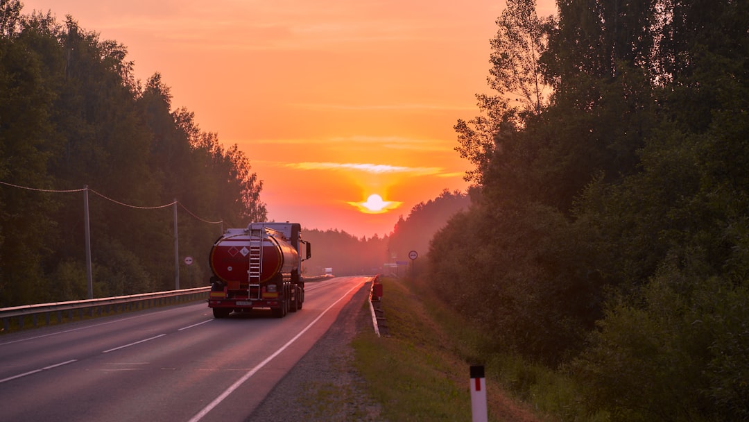 Freight truck on highway at sunset